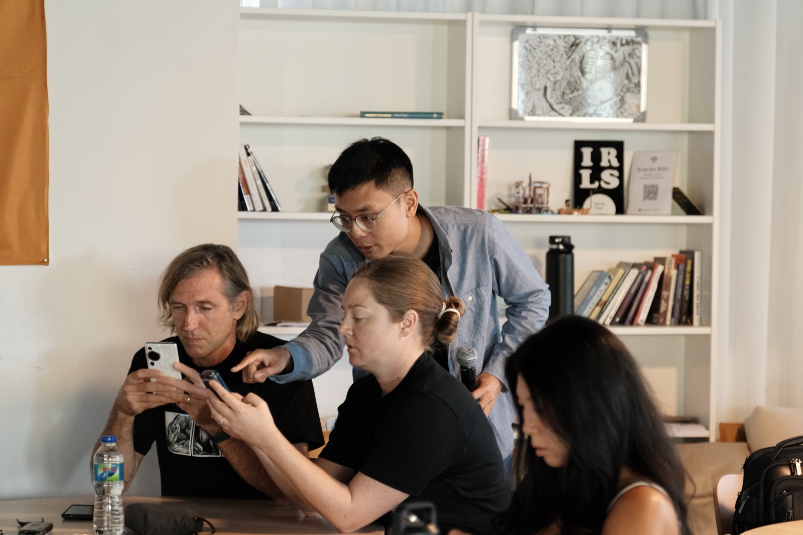 Tony helping participants during a hands-on workshop